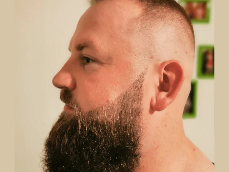 Barber at work — scissors and comb close-up