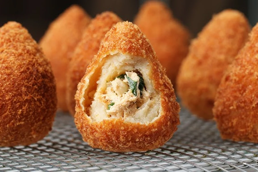 Coxinhas — Brazilian chicken croquettes freshly fried
