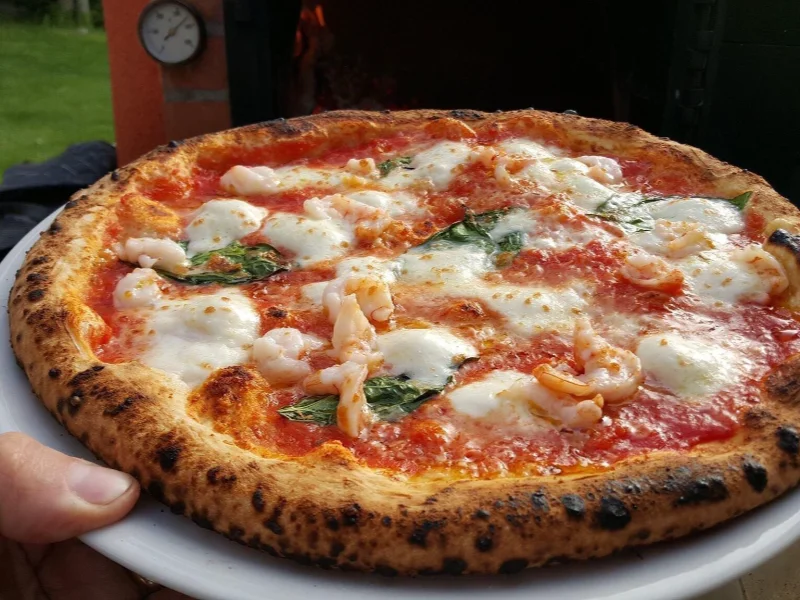 Neapolitan Margherita out of the wood-fired oven